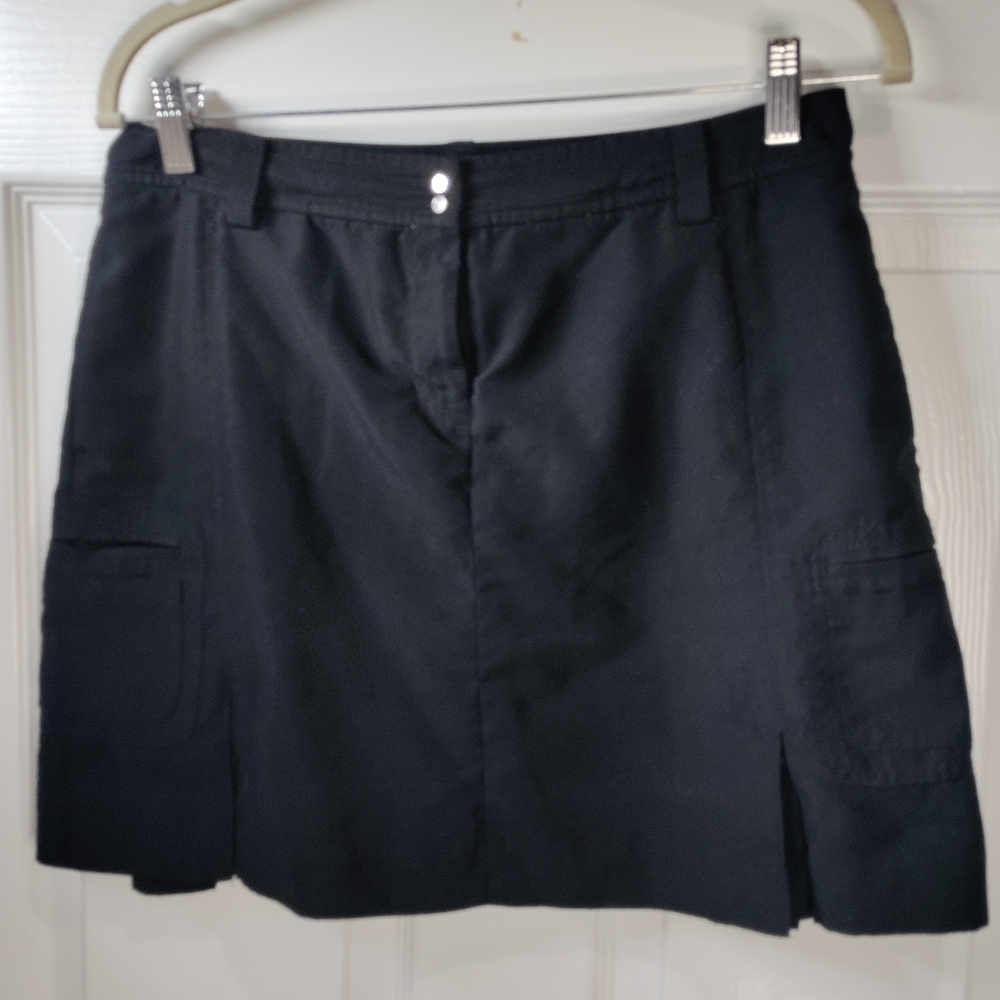Izod women's black golf skort size 4